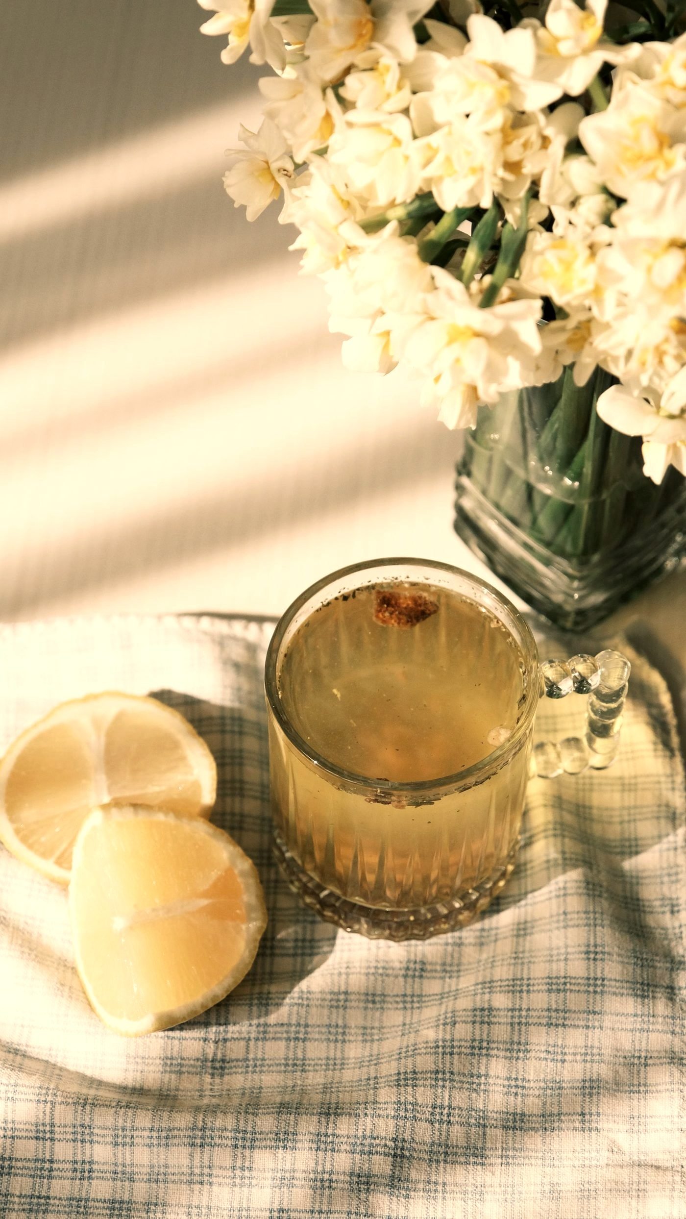 Wellness items including tea, a journal and soft textiles